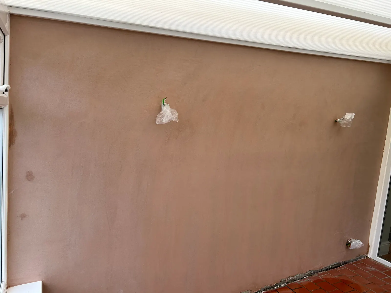 Smoothly skimmed conservatory wall with a clean, even finish