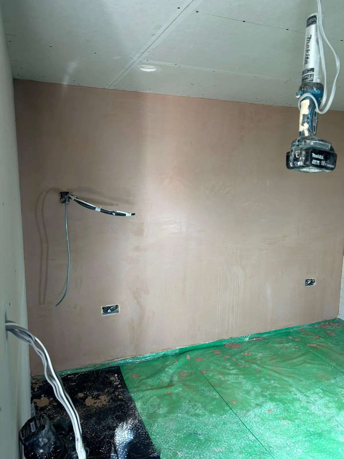 Freshly skimmed wall during a full room refurbishment