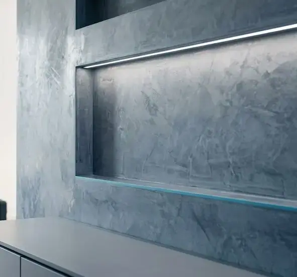 Metallic Venetian plaster wall finish with built-in shelf lighting